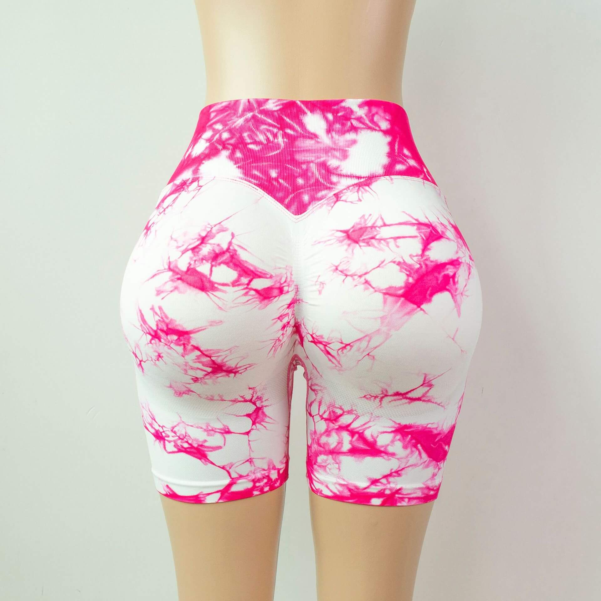 Pink marble seamless scrunch butt shorts with high waist, perfect for yoga and active women seeking style and comfort.